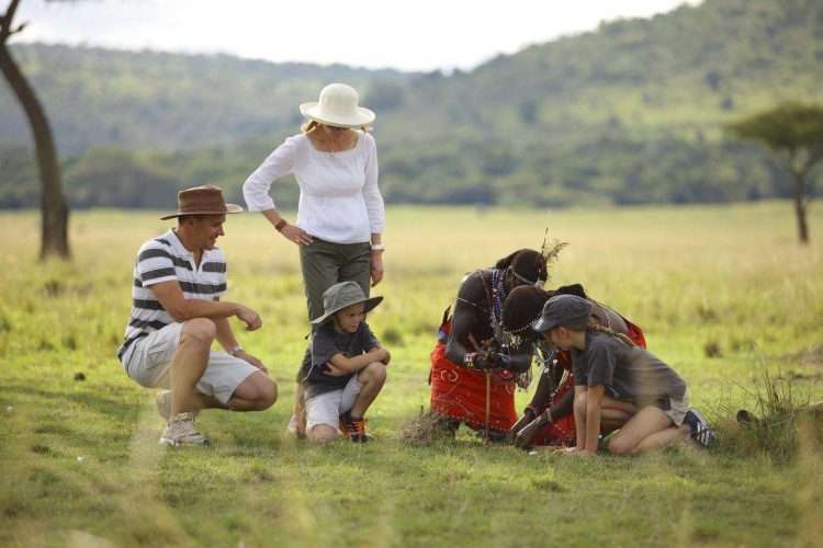 Happy family on safari at kichwa tembo camp located in Masai Mara National Reserve. Book best Africa family safaris in Kenya and Tanzania with Africa Kenya Safaris