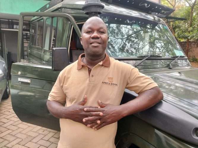 John Munguti safari guide at Africa Kenya Safaris scaled