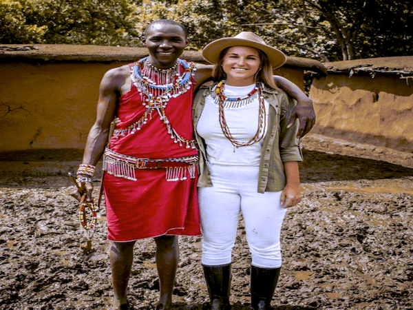 Maasai and safari goer